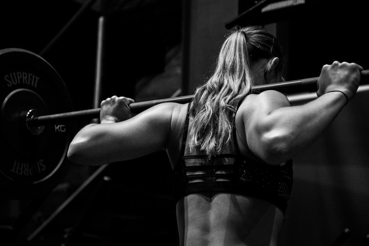 Coach guiding a gym training session